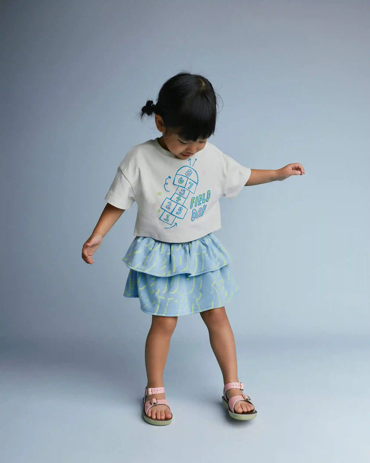 Toddler Girl Smocked Tiered Skirt in Otter Avenue Print - Light Blue/Lime Green